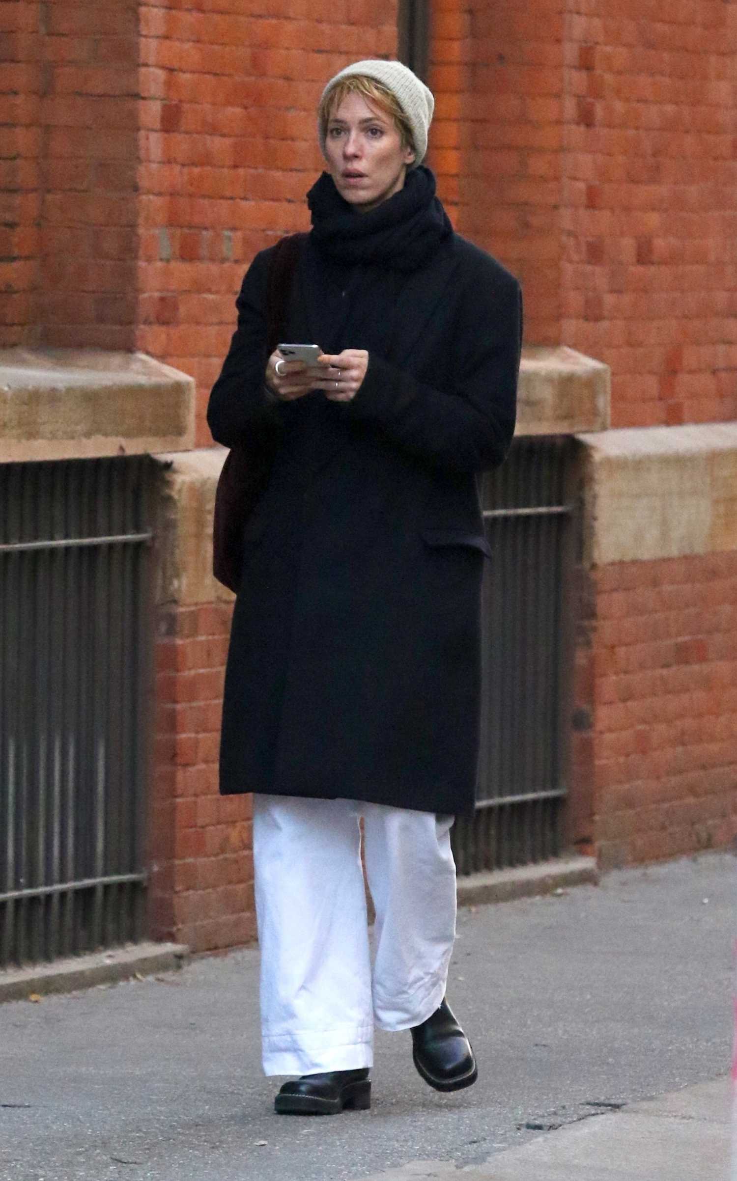 Rebecca Hall in a Black Coat Goes Shopping Around Manhattan’s Soho Area