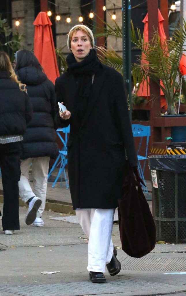 Rebecca Hall in a Black Coat