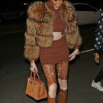 Winnie Harlow in a Brown Ensemble Leaves Revolve Winterland Holiday Event in Los Angeles