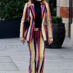Amanda Holden in a Striped Pantsuit Leaves the Global Radio Studios in London