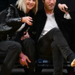 Ashley Benson Attends a Basketball Game Between the Los Angeles Lakers and the Miami Heat with Brandon Davis at Crypto.com Arena in Los Angeles
