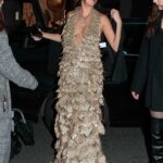 Ashley Park in a Gold Dress Was Seen During 2023 Paris Fashion Week in Paris