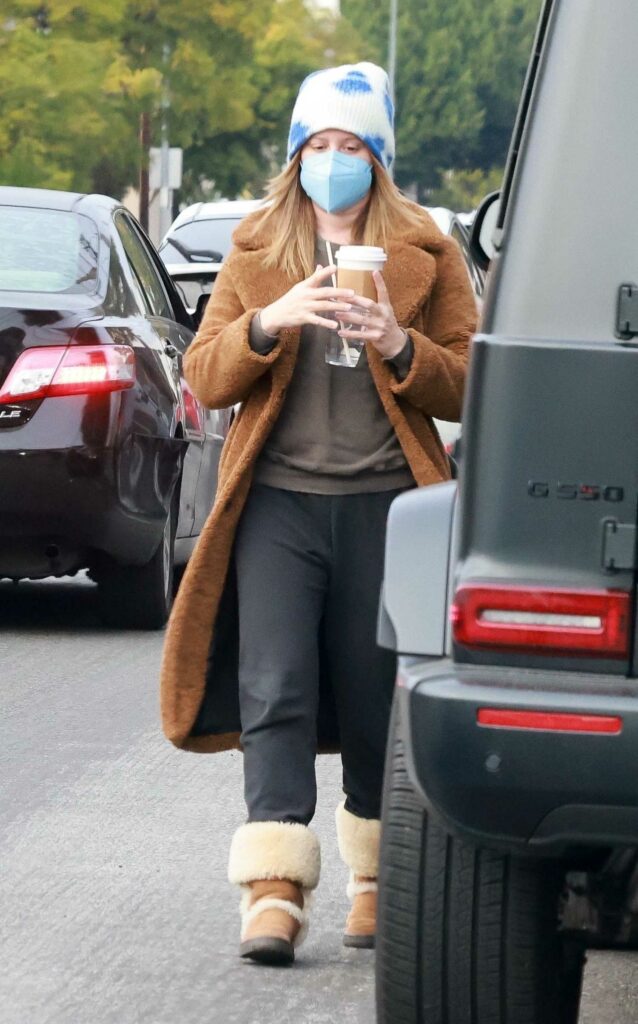 Ashley Tisdale in a Brown Fur Coat