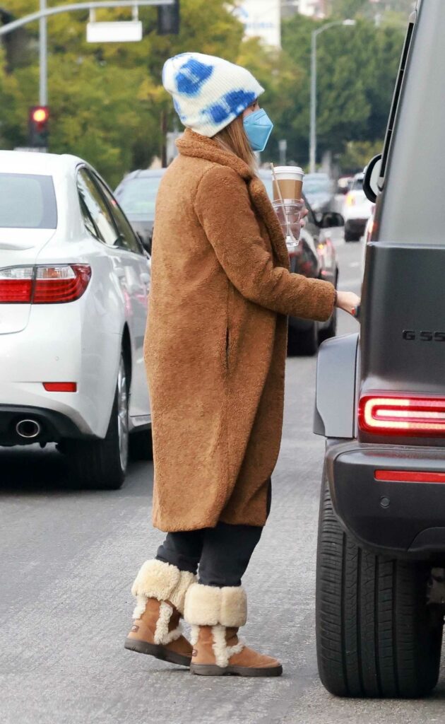 Ashley Tisdale in a Brown Fur Coat