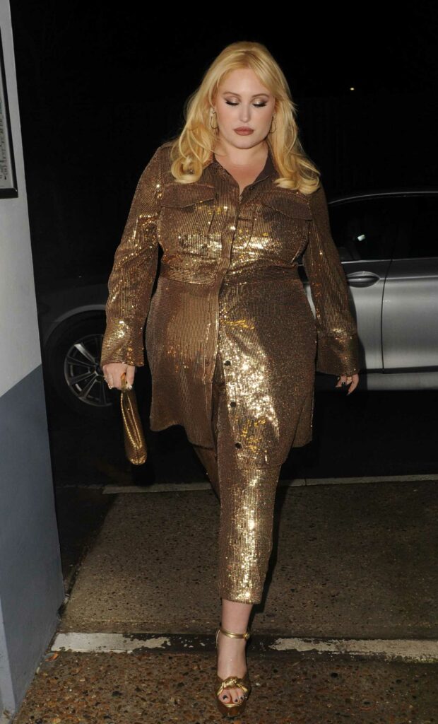 Hayley Hasselhoff in a Gold Ensemble