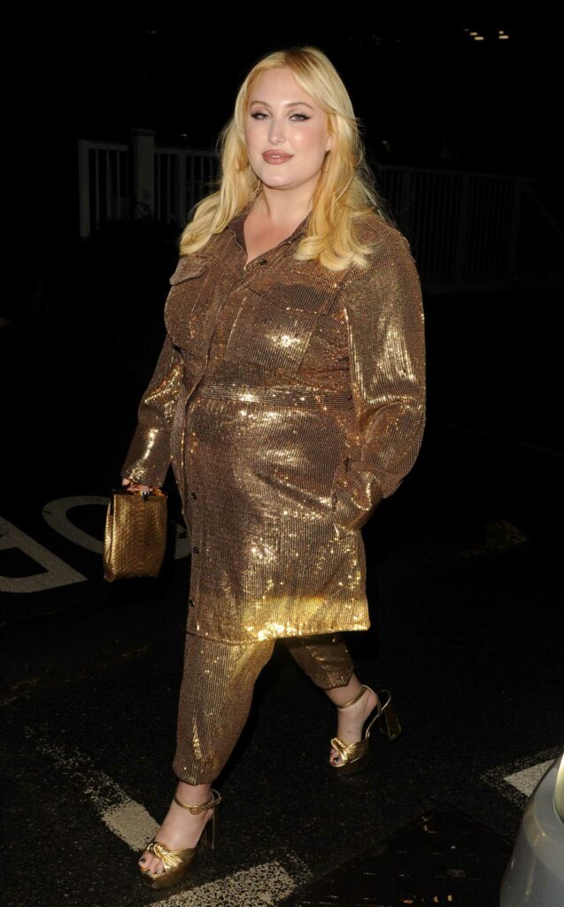 Hayley Hasselhoff in a Gold Ensemble