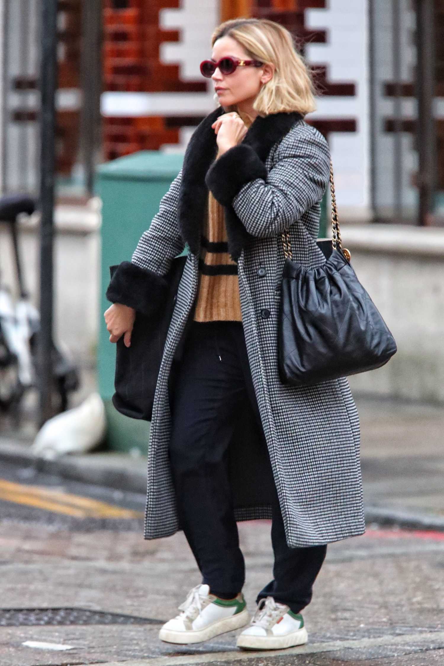 Jenna Coleman in a Grey Coat Leaves Rehearsels for Lemons Lemons Lemons ...