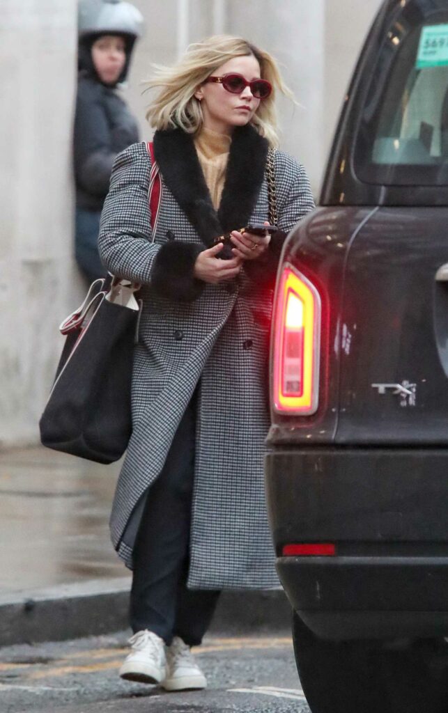 Jenna Coleman in a Grey Coat