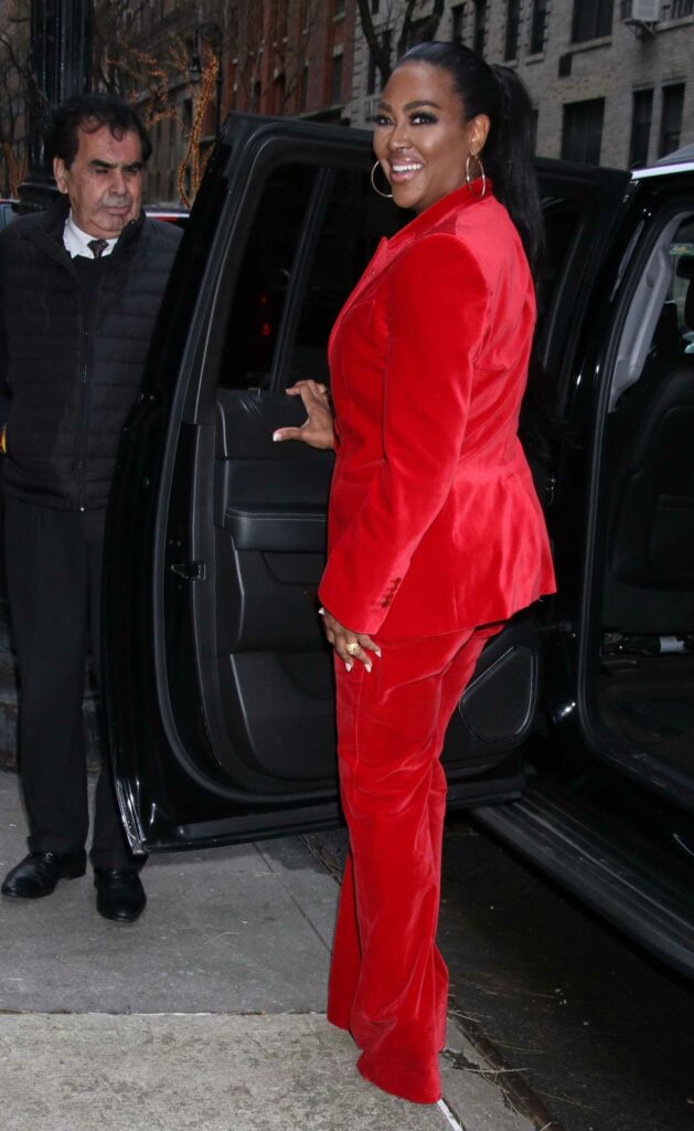 Kenya Moore in a Red Pantsuit