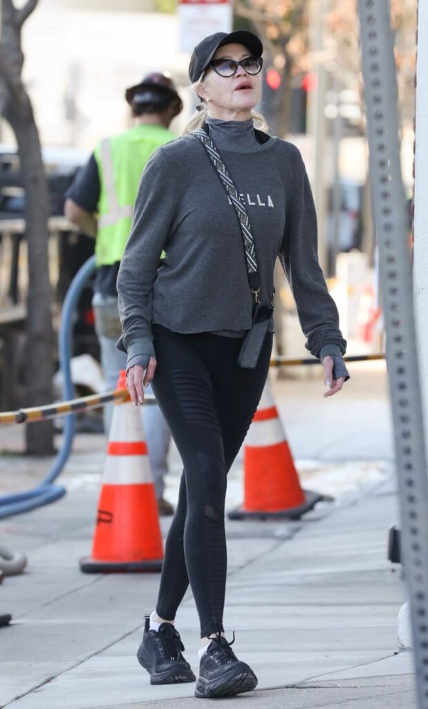 Melanie Griffith in a Black Sneakers