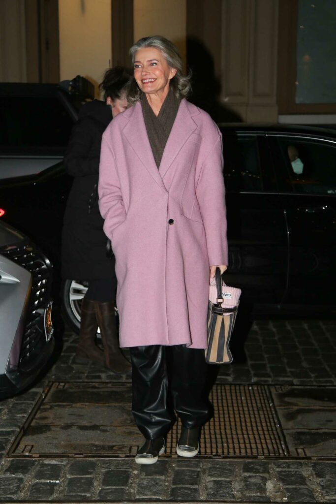 Paulina Porizkova in a Pink Coat