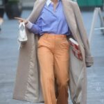 Ashley Roberts in an Orange Pants Leaves the Heart Radio in London