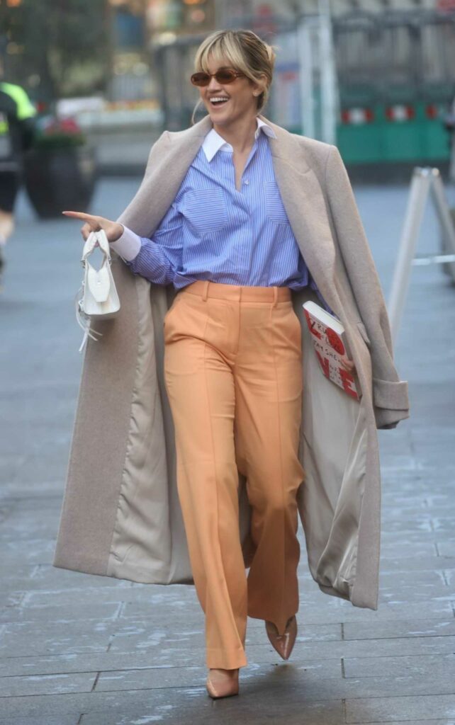 Ashley Roberts in an Orange Pants