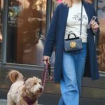 Busy Philipps in a Blue Coat Walks Her Dog in Manhattan’s West Village Neighborhood in NYC