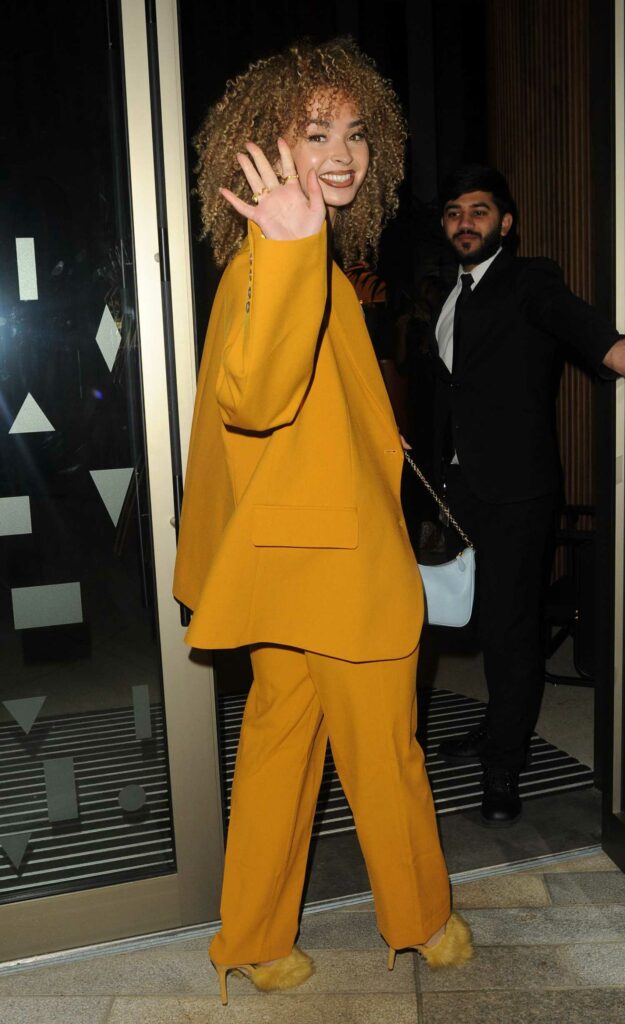Ella Eyre in a Yellow Pantsuit