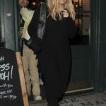 Emily Atack in a Black Knitted Dress Leaves The Green Man Pub in London