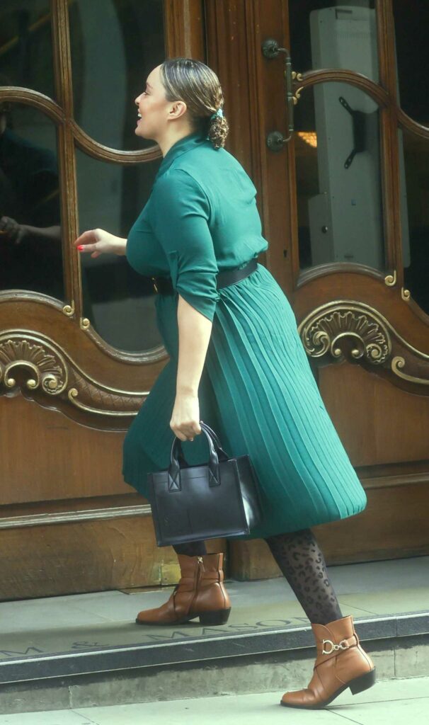 Pandora Christie in a Green Dress