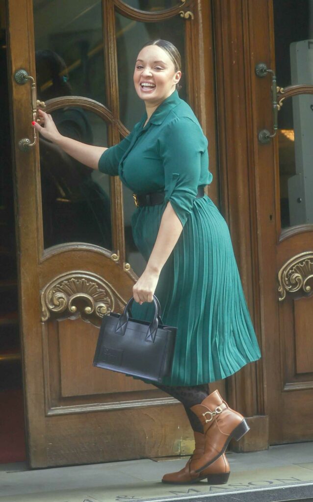 Pandora Christie in a Green Dress