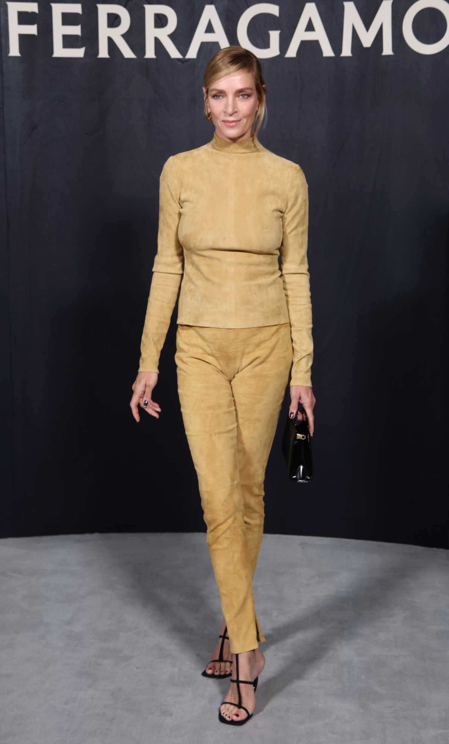 Uma Thurman Attends the Salvatore Ferragamo Fashion Show During 2023