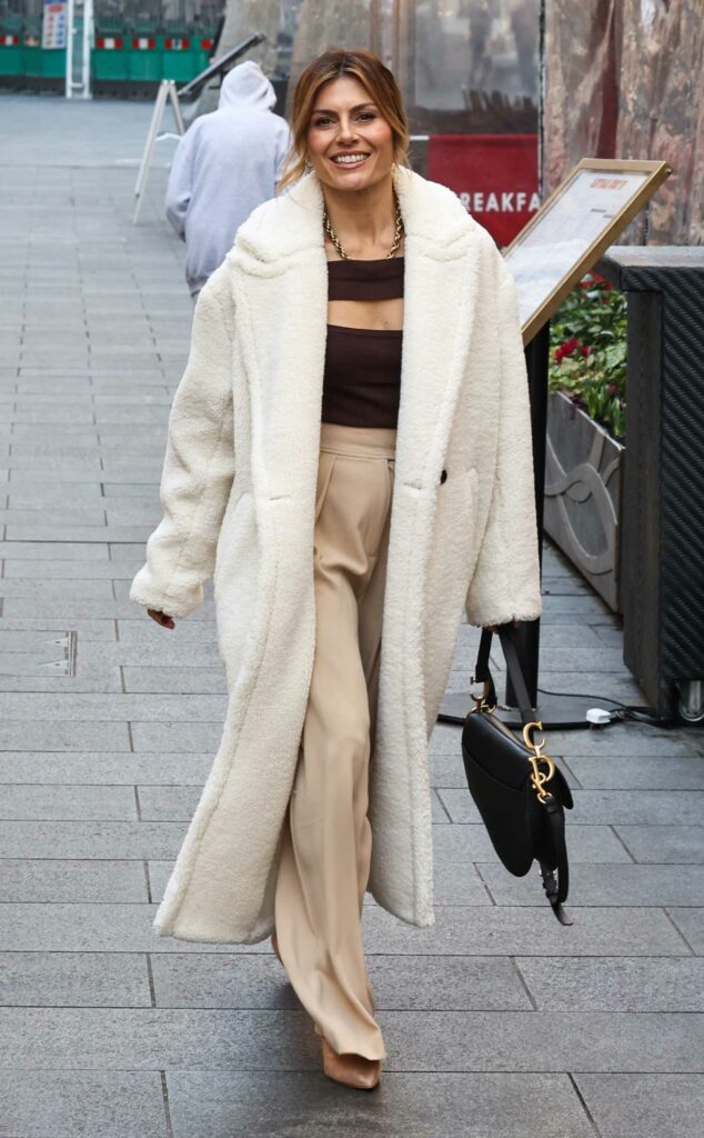 Zoe Hardman in a White Fur Coat