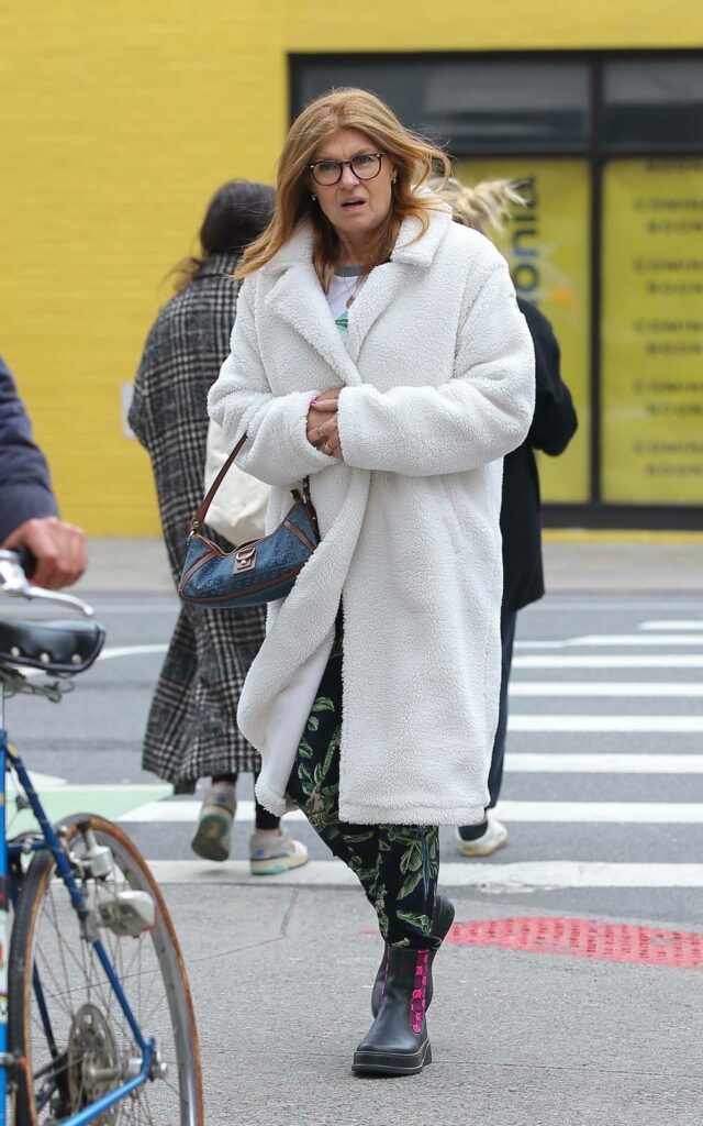 Connie Britton in a White Faux Fur Coat