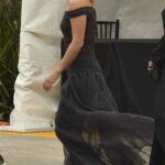 Emma Watson in a Black Dress Leaves the Four Seasons Hotel in Beverly Hills