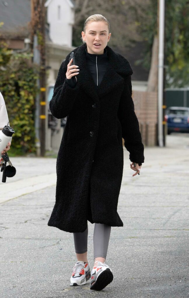Lala Kent in a Black Faux Fur Coat