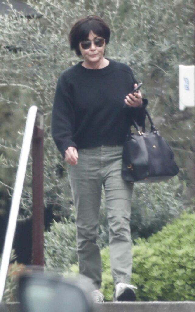 Shannen Doherty in a Black Sweatshirt