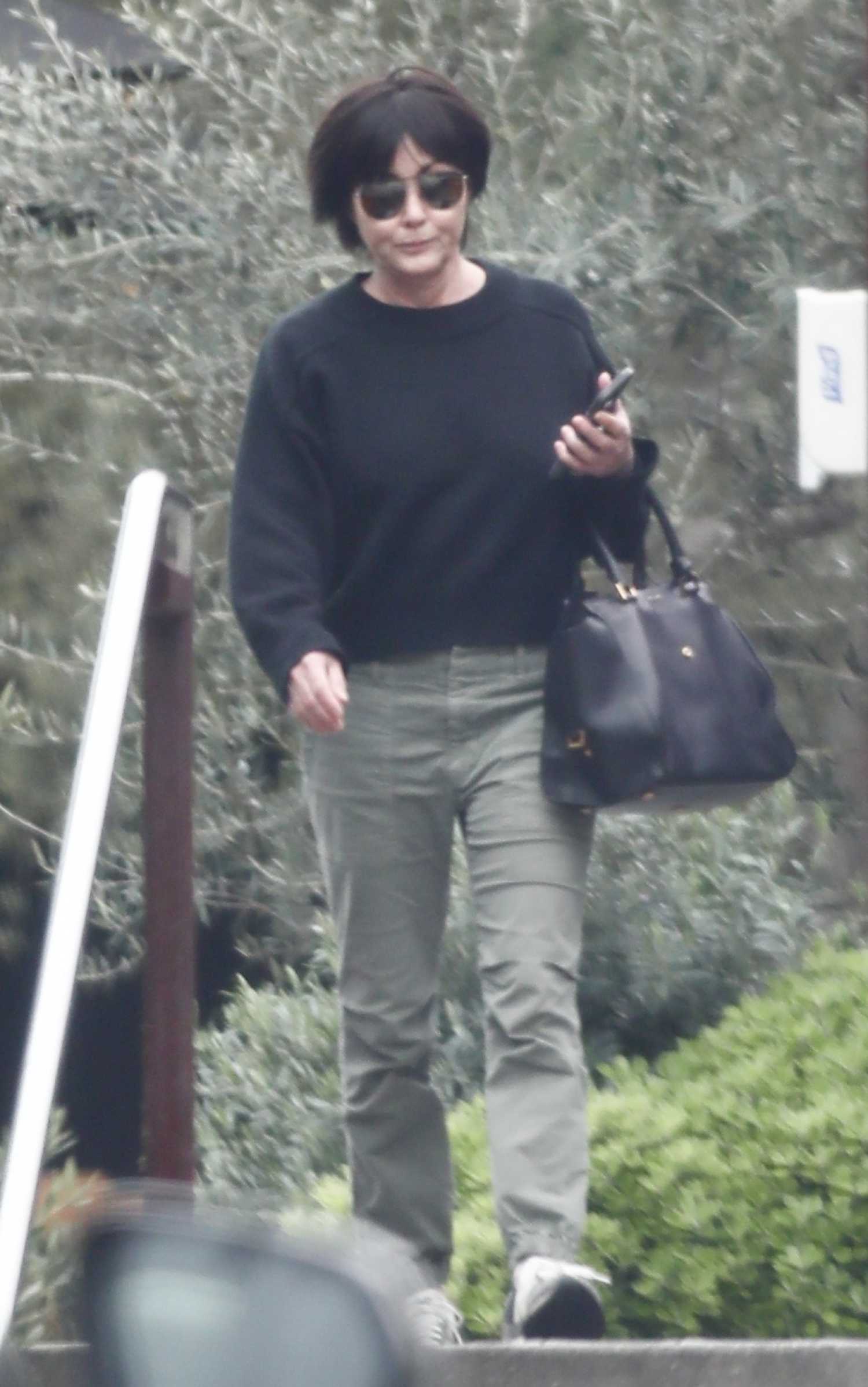 Shannen Doherty in a Black Sweatshirt Enjoys a Solo Shopping Trip in