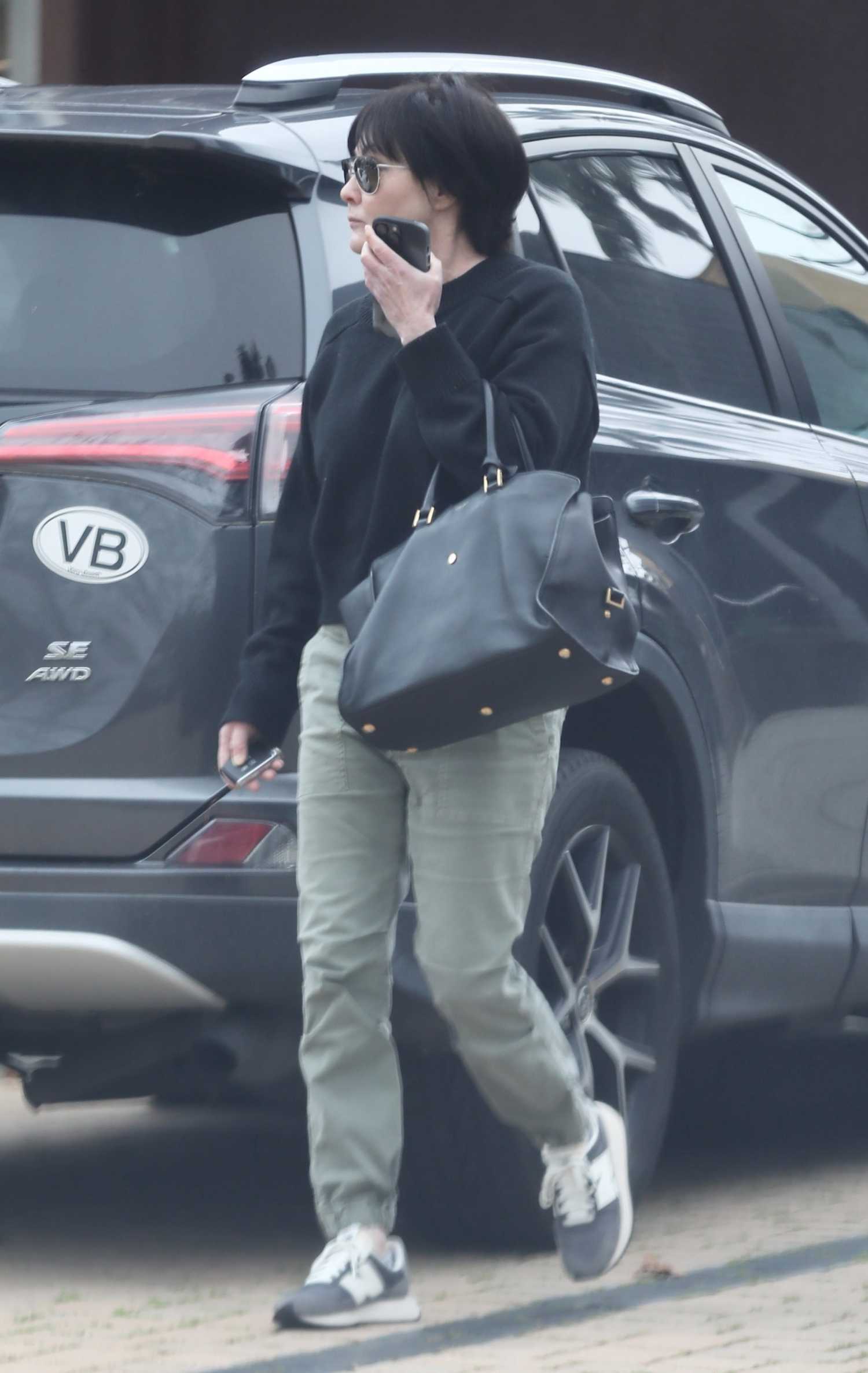 Shannen Doherty in a Black Sweatshirt Enjoys a Solo Shopping Trip in