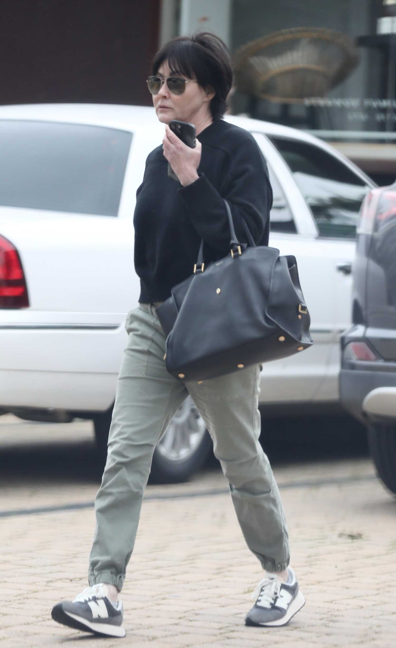 Shannen Doherty in a Black Sweatshirt Enjoys a Solo Shopping Trip in