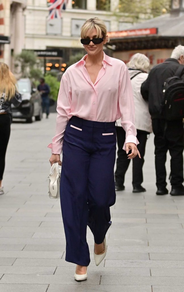 Ashley Roberts in a Pink Blouse
