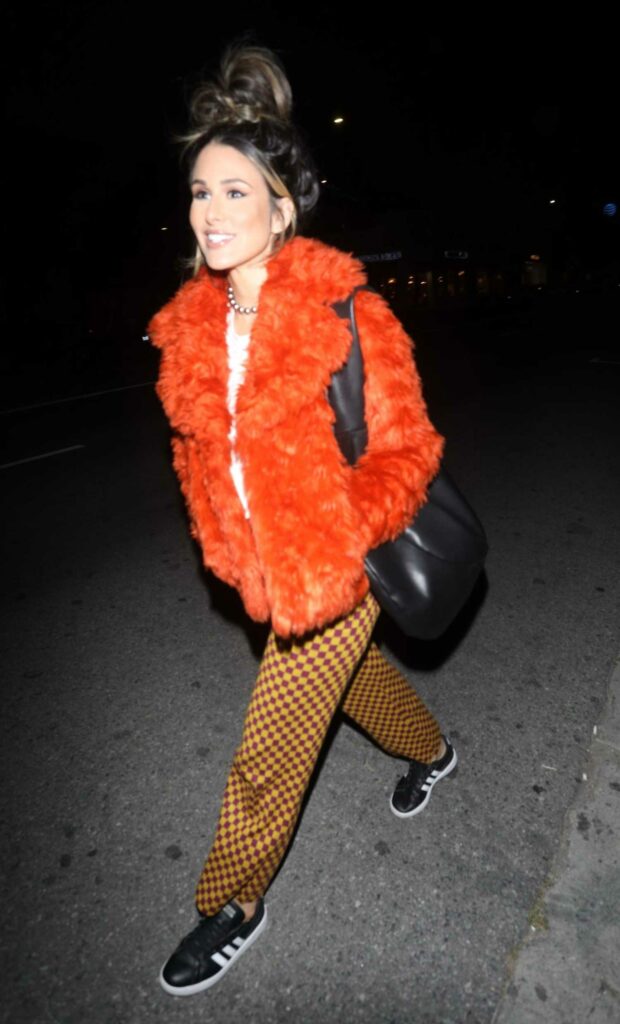 Brittany Furlan in an Orange Jacket