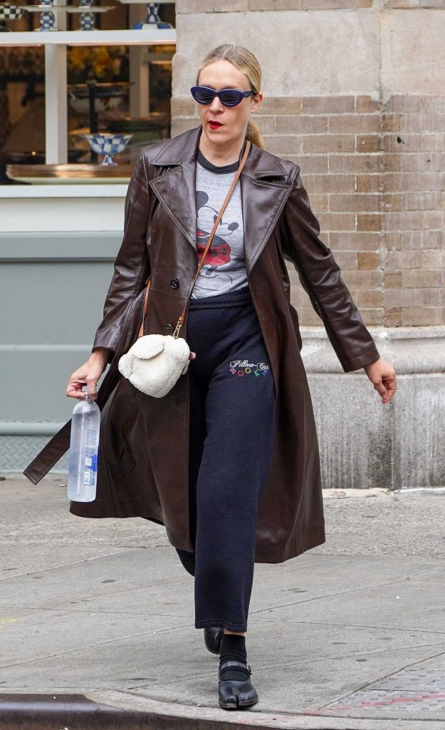 Chloe Sevigny in a Brown Leather Trench Coat