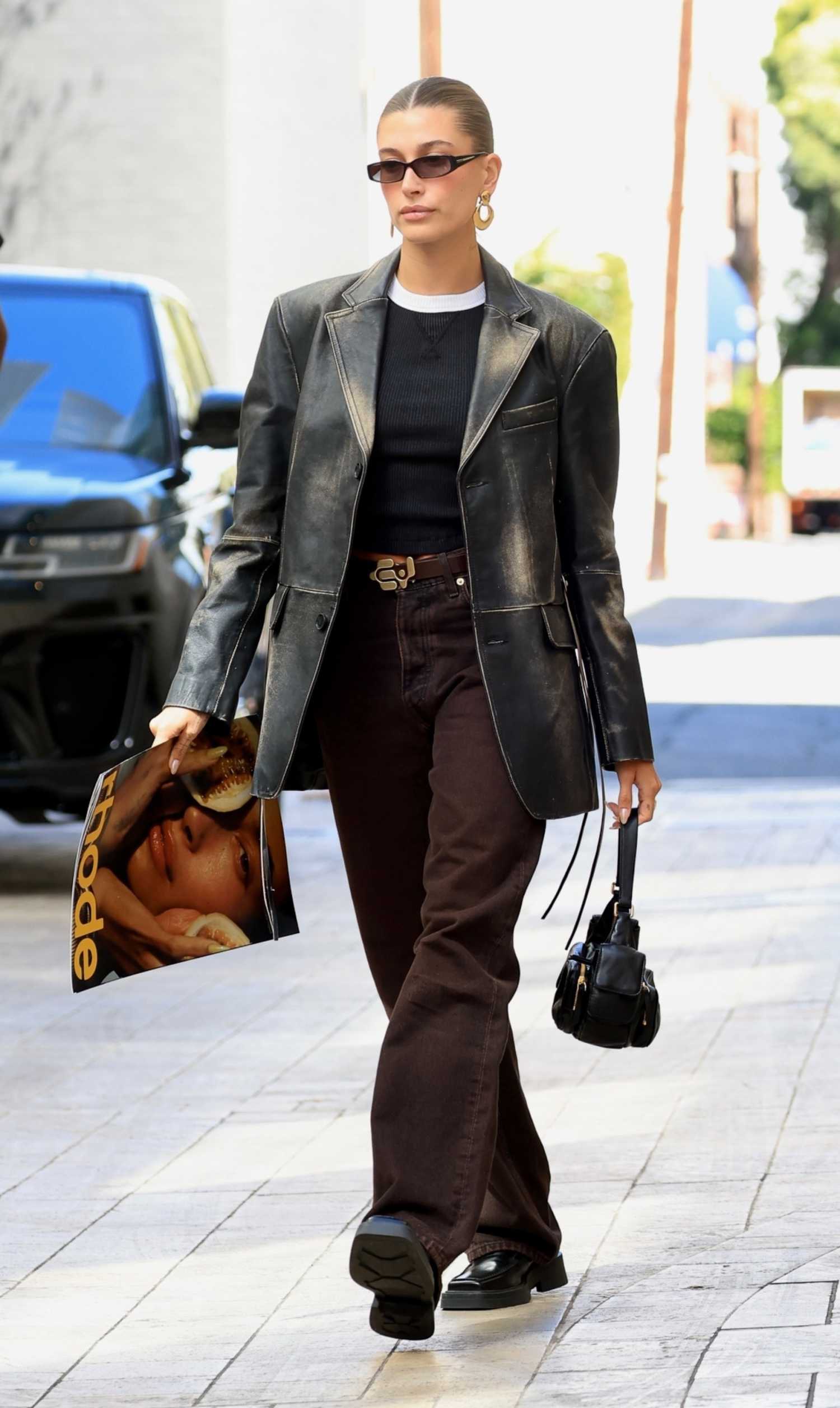 Hailey Bieber in a Black Leather Blazer Leaves Rhode’s Office in
