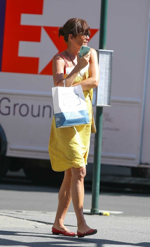 Helena Christensen in a Yellow Dress