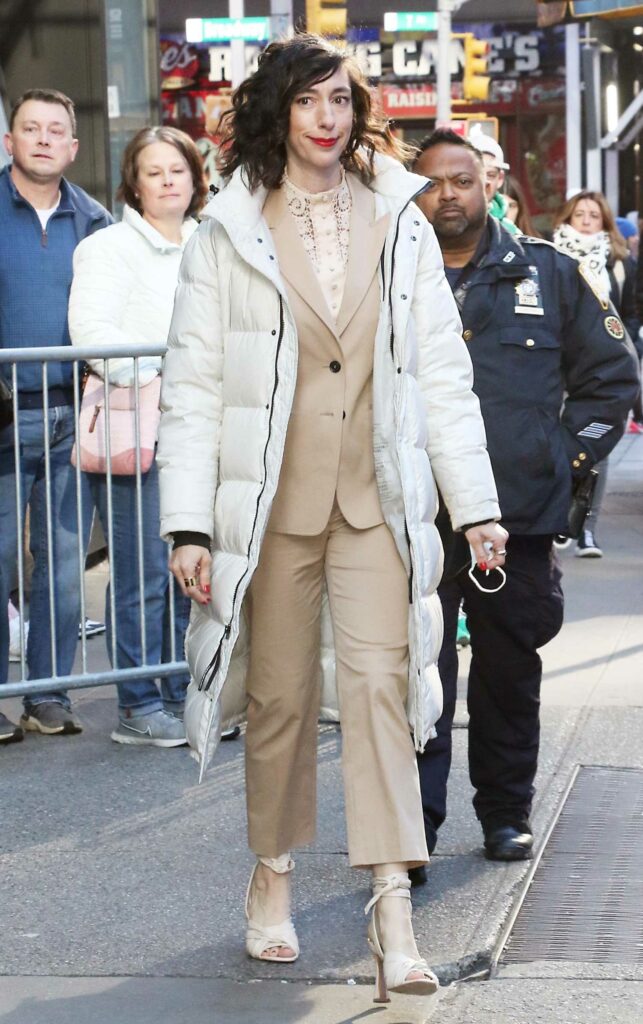 Lana Wilson in a White Puffer Coat