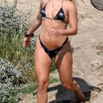Antigoni Buxton in a Black Bikini on the Beach in Greece