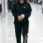 Halle Bailey in a Black Sweatsuit Arrives at LAX Airport in Los Angeles