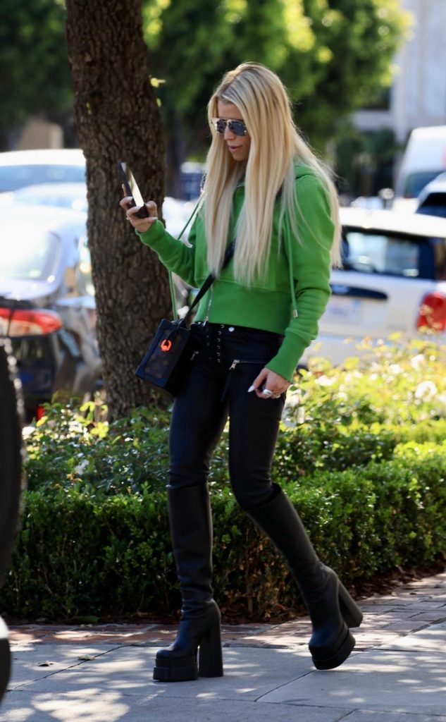 Jessica Simpson in a Black Boots