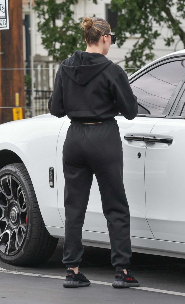 Khloe Kardashian in a Black Sweatsuit