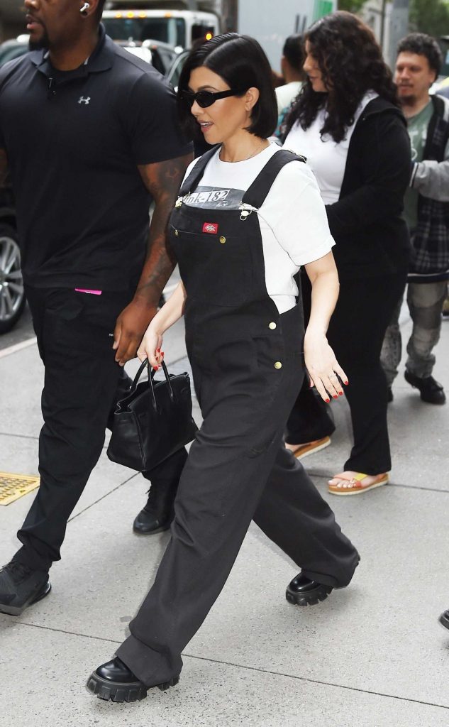 Kourtney Kardashian in a Black Jumpsuit