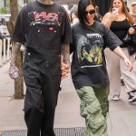 Kourtney Kardashian in an Olive Pants Takes a Romantic Stroll with Travis Barker Down 5th Avenue in New York