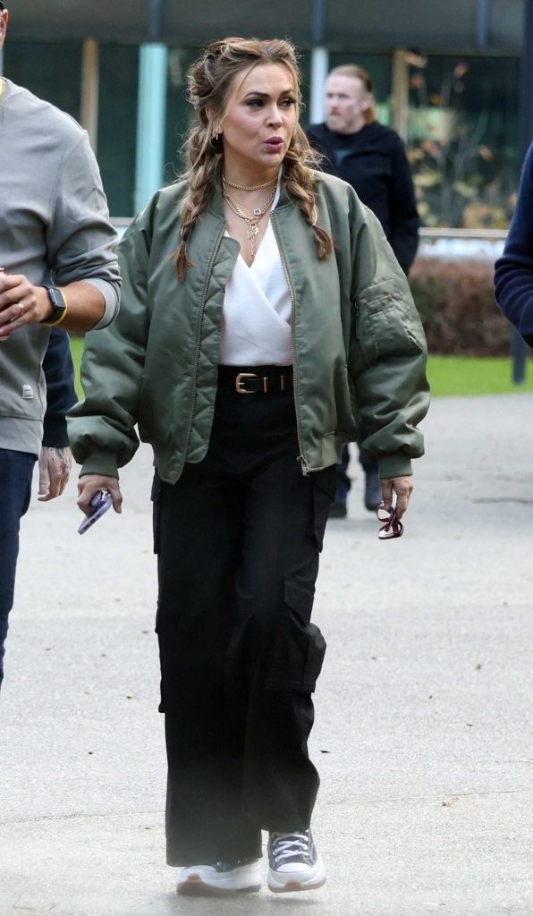 Alyssa Milano in an Olive Bomber Jacket