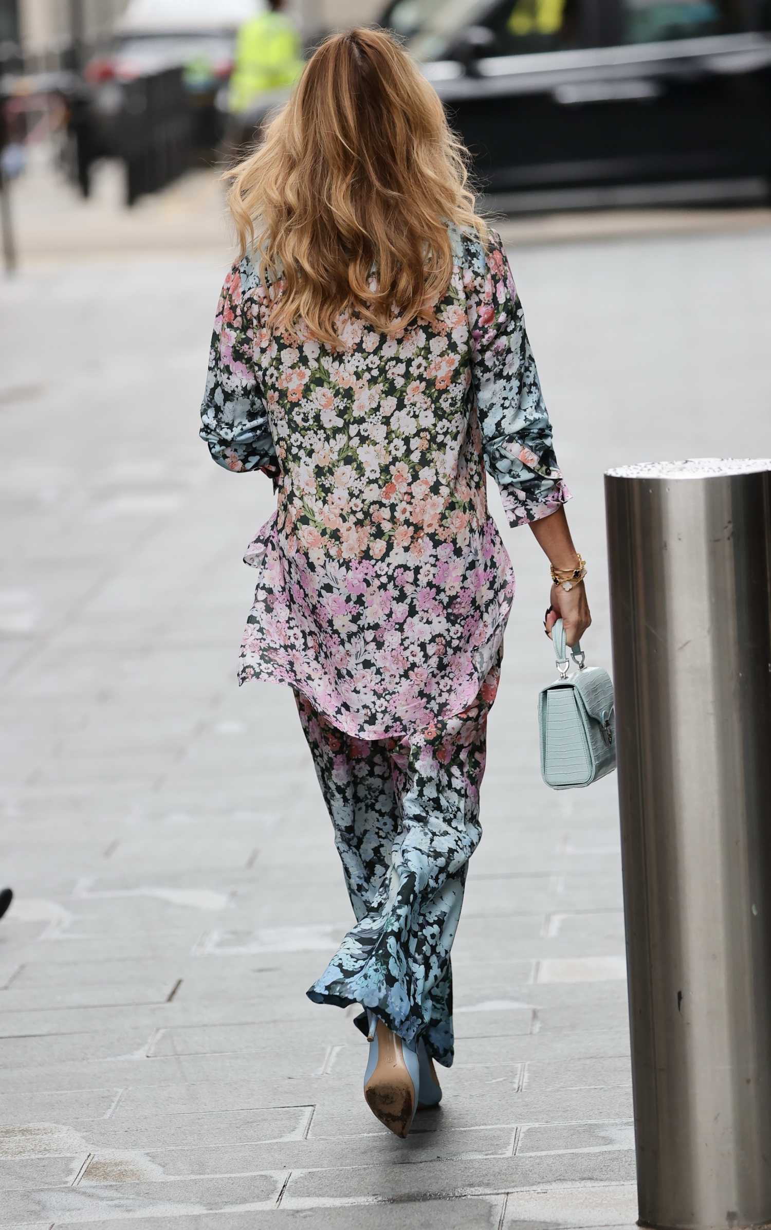 Amanda Holden in a Floral Trouser Suit Leaves the Heart Breakfast Show