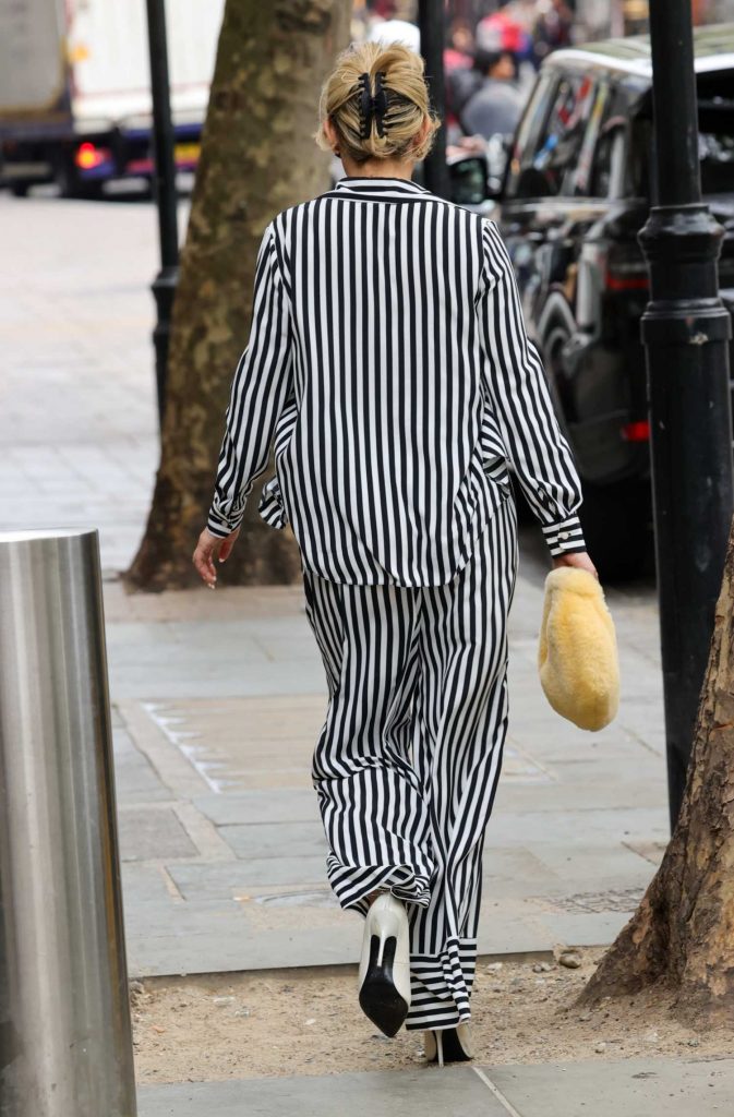 Ashley Roberts in a Striped Monochrome Pantsuit