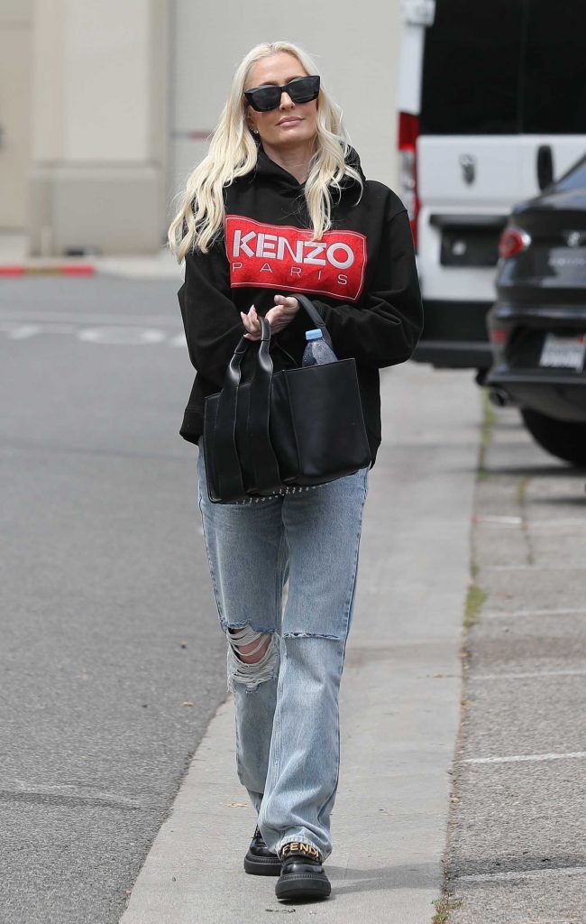 Erika Jayne in a Blue Ripped Jeans