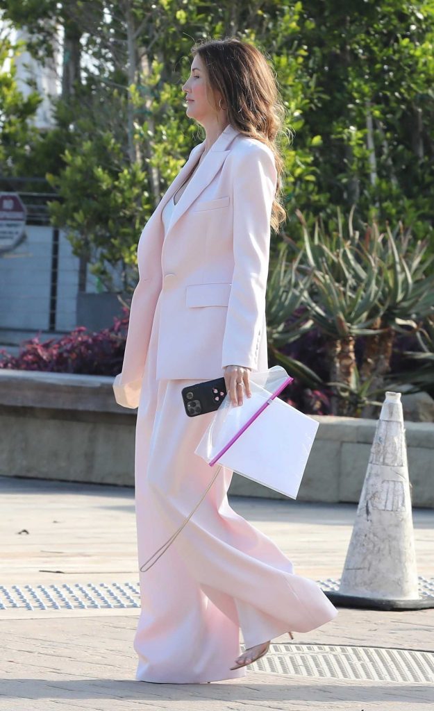 Jackie Sandler in a Pink Pantsuit