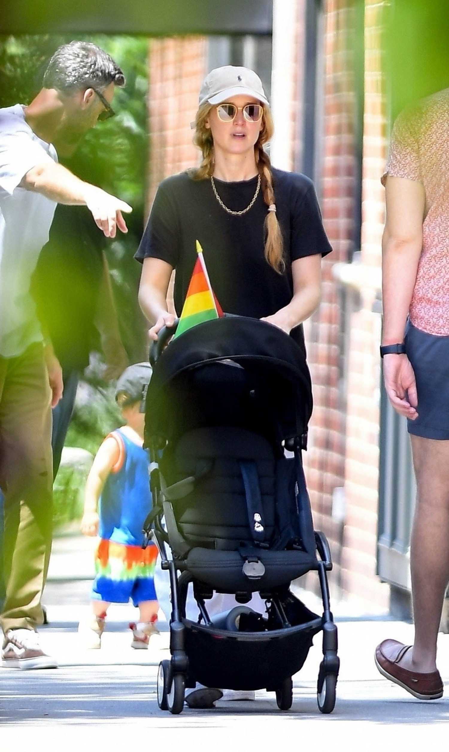 Jennifer Lawrence in a Black Tee Enjoys the LGBT Pride March in New