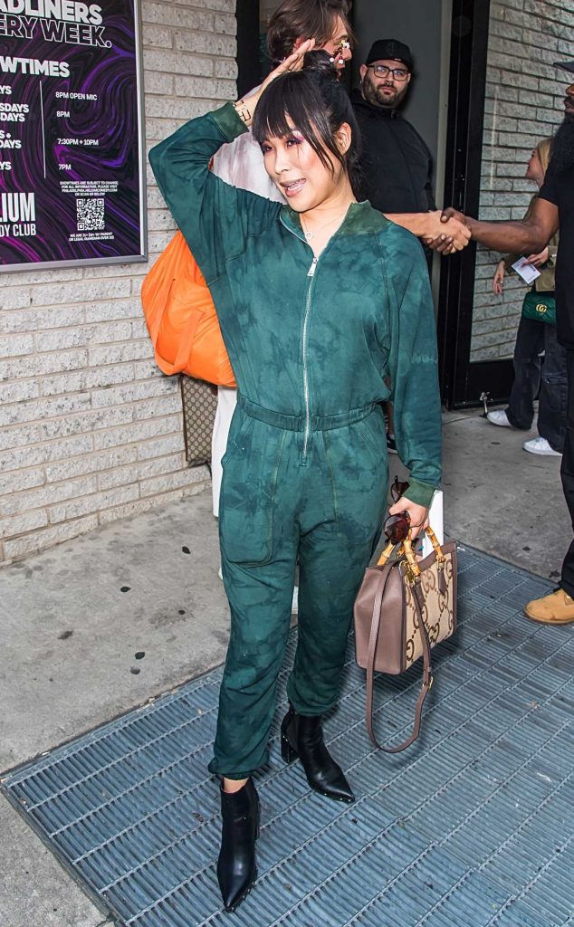 Jiaoying Summers in a Green Jumpsuit